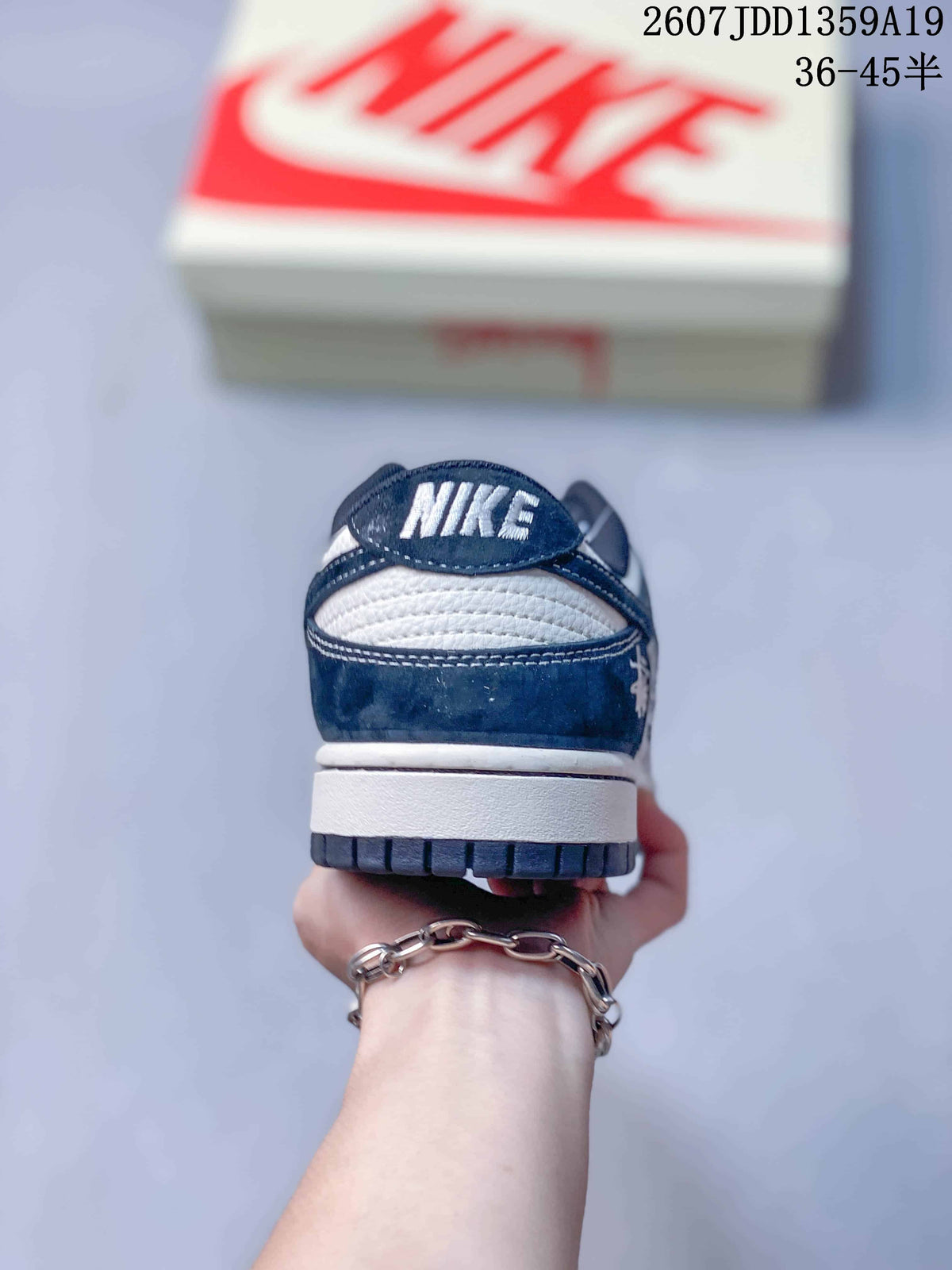 Air Jordan 1 Low Navy White Sneakers 2607JDD1359A19 - product image from the listing.