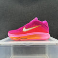 Pink and Purple Nike Basketball Sneakers - product image from the listing.