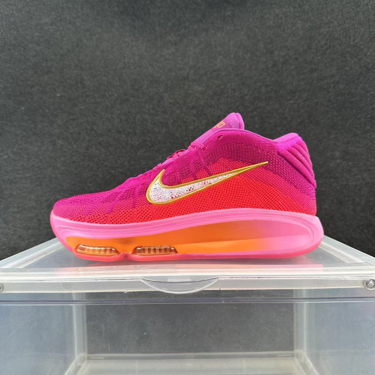 Pink and Purple Nike Basketball Sneakers - product image from the listing.