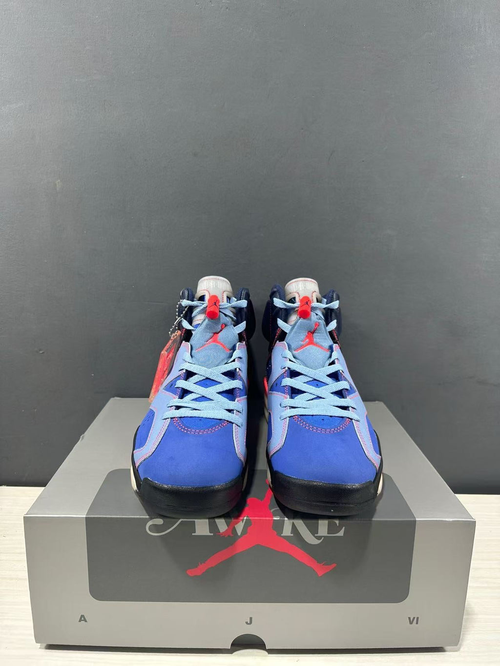 Jordan 6 Retro High-Top Sneakers in Blue IQ5706-400 - product image from the listing.