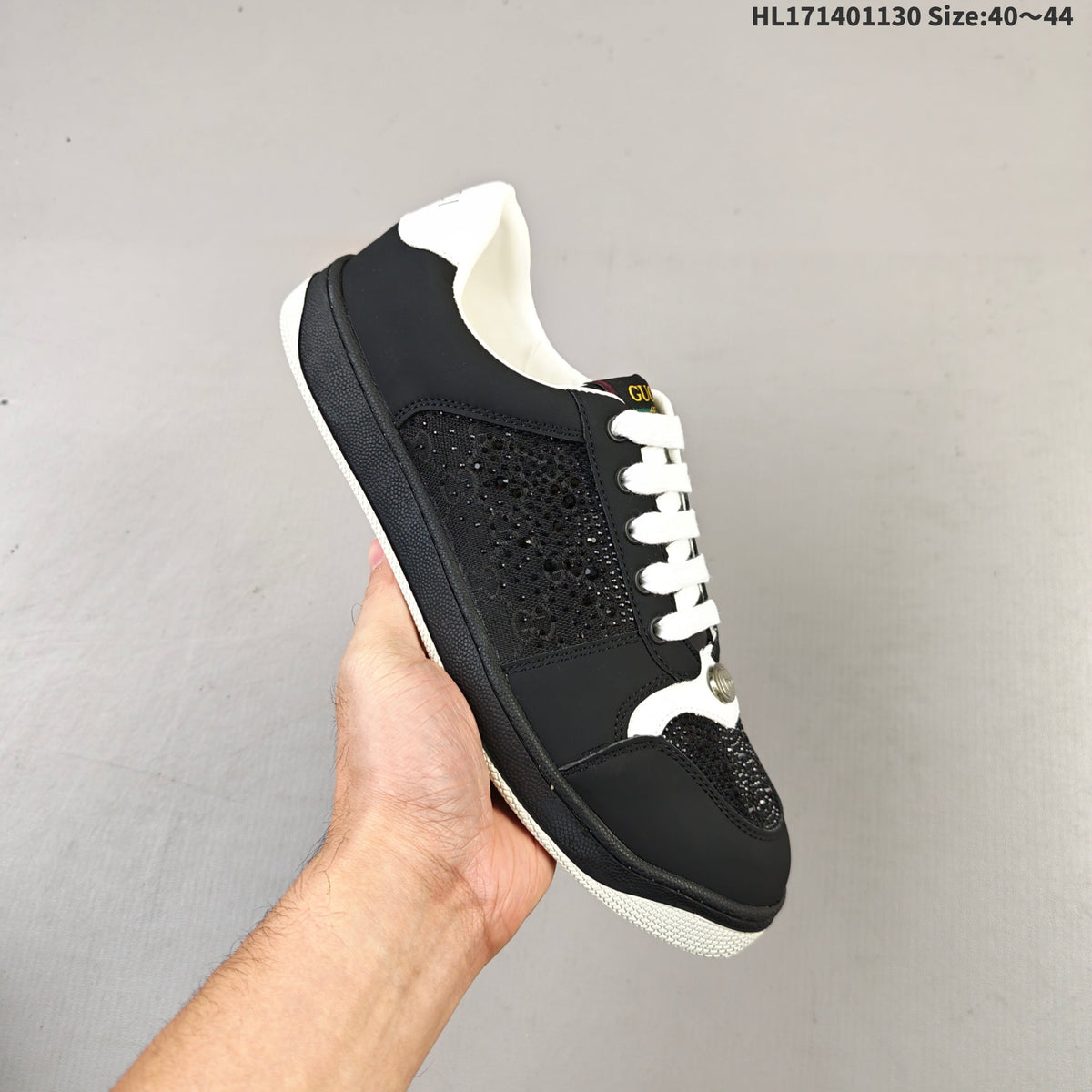 Gucci Screener Distressed Low-Top Sneakers in Black and White HL171401130 - product image from the listing.