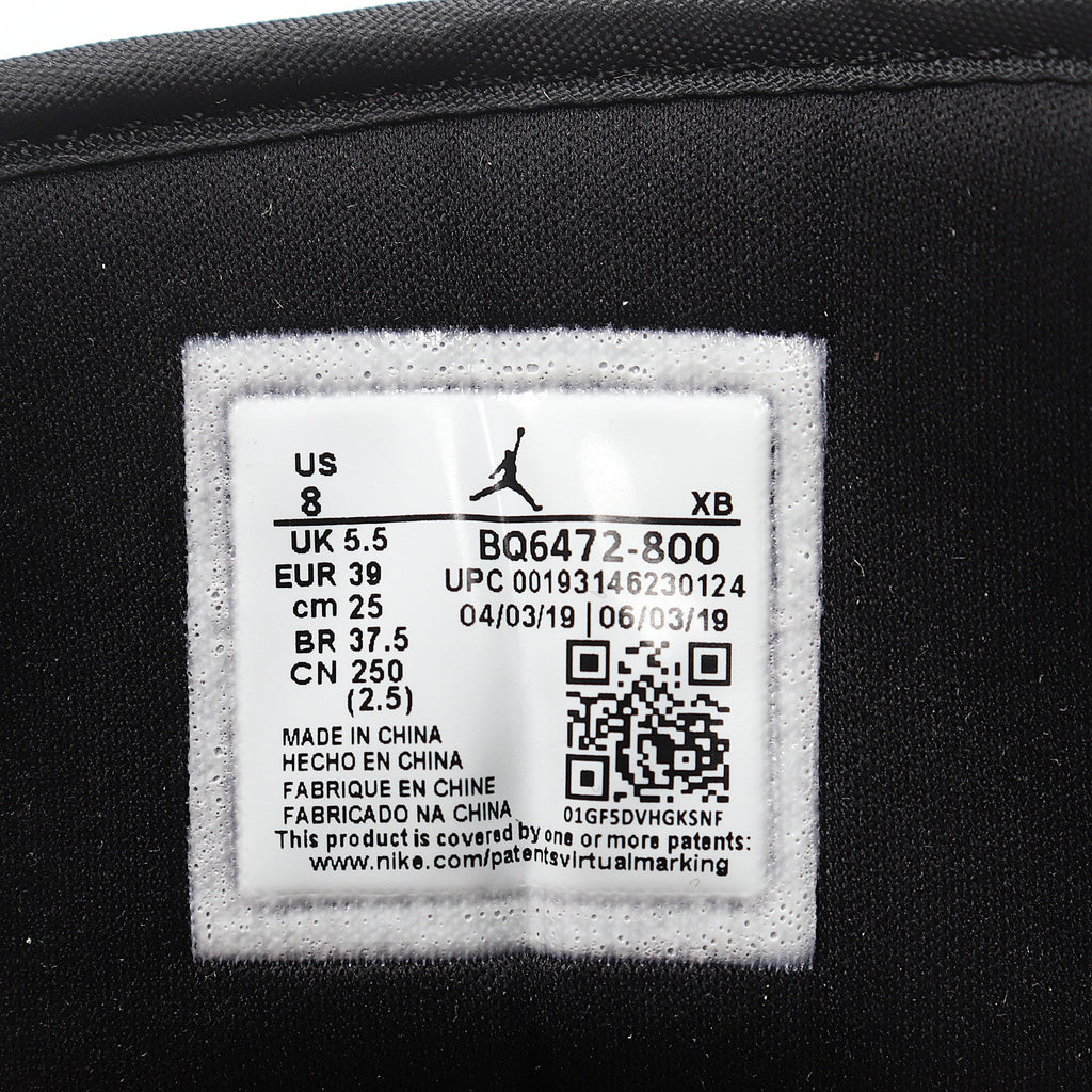 Jordan 1 Low BQ6472-800 Sneakers in Tan and Black - product image from the listing.