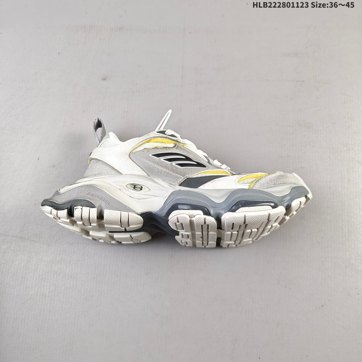 Gray and White Balenciaga Monday Low-Top Sneakers - product image from the listing.