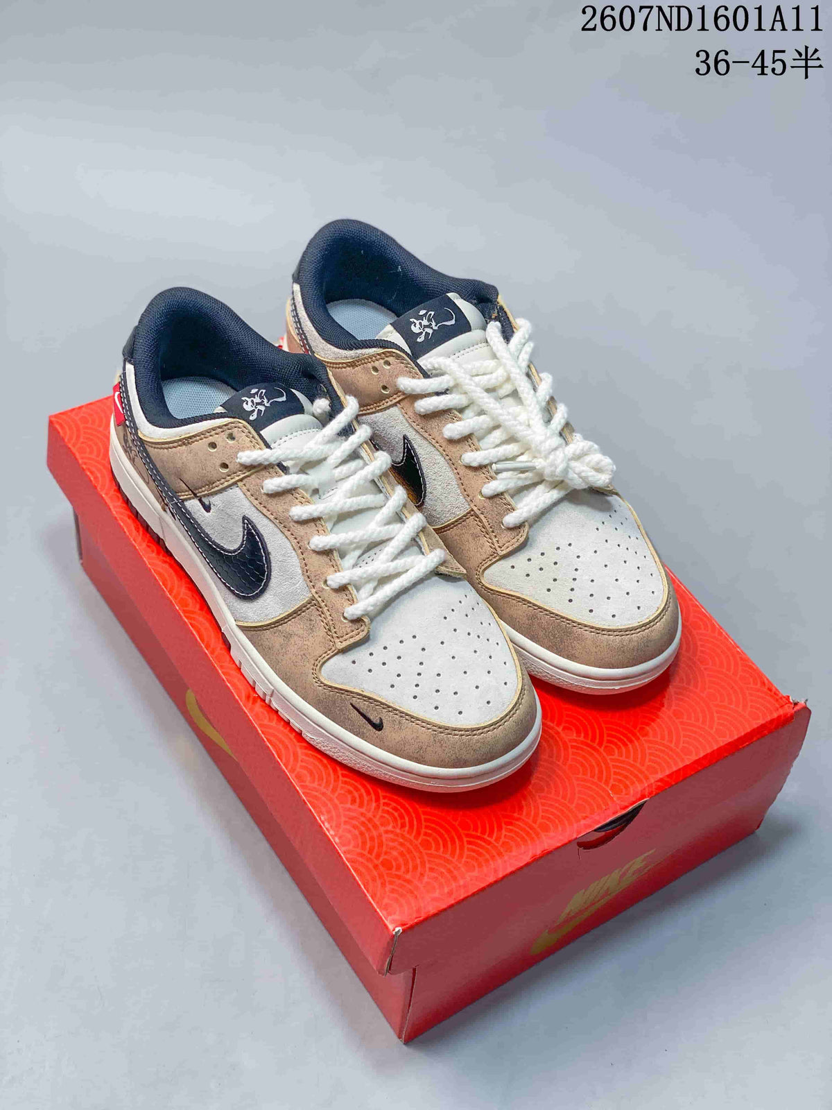 Nike SB Dunk Low Sneakers in Off-White Tan White Navy - product image from the listing.