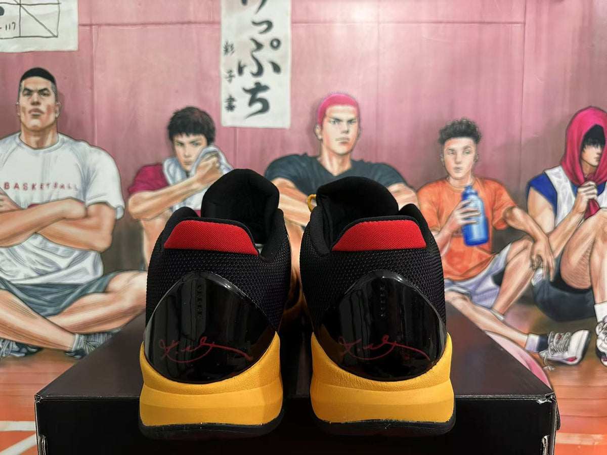 Yellow and Black Nike Kobe Basketball Shoes - product image from the listing.