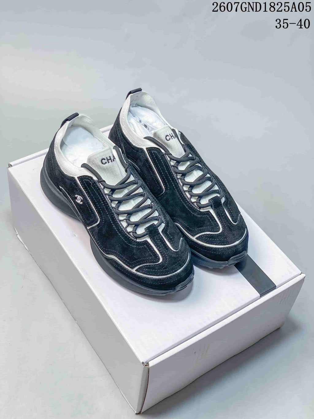 Chanel Low-Top Sneakers in Black and White 2607GND1825A05 - product image from the listing.