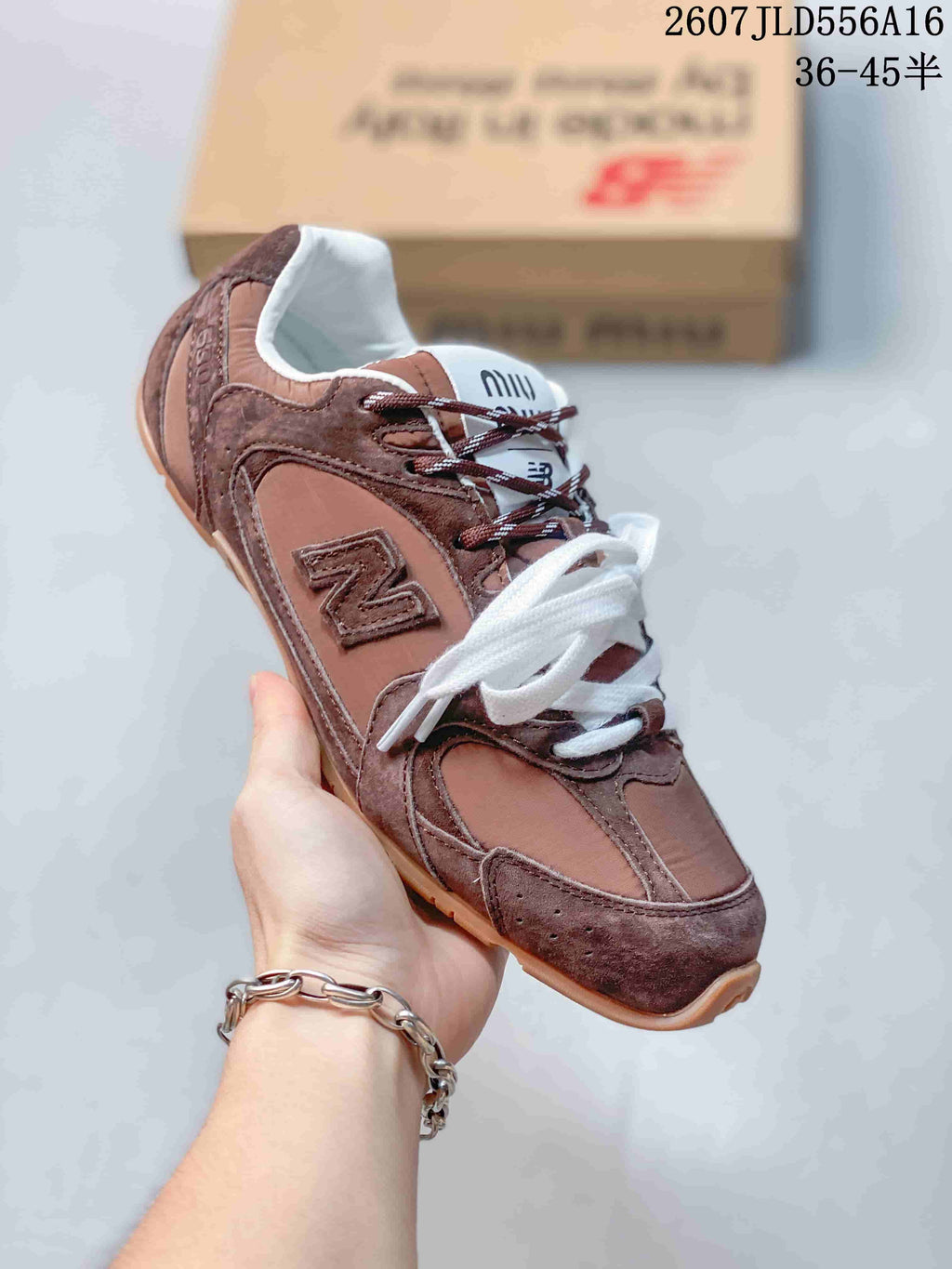Miu Miu x New Balance 530 SL Sneakers in Brown 2607JLD556A16 - product image from the listing.