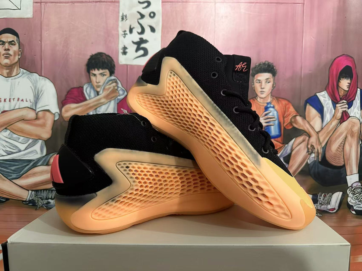 Black and Orange Adidas Basketball Shoes - product image from the listing.