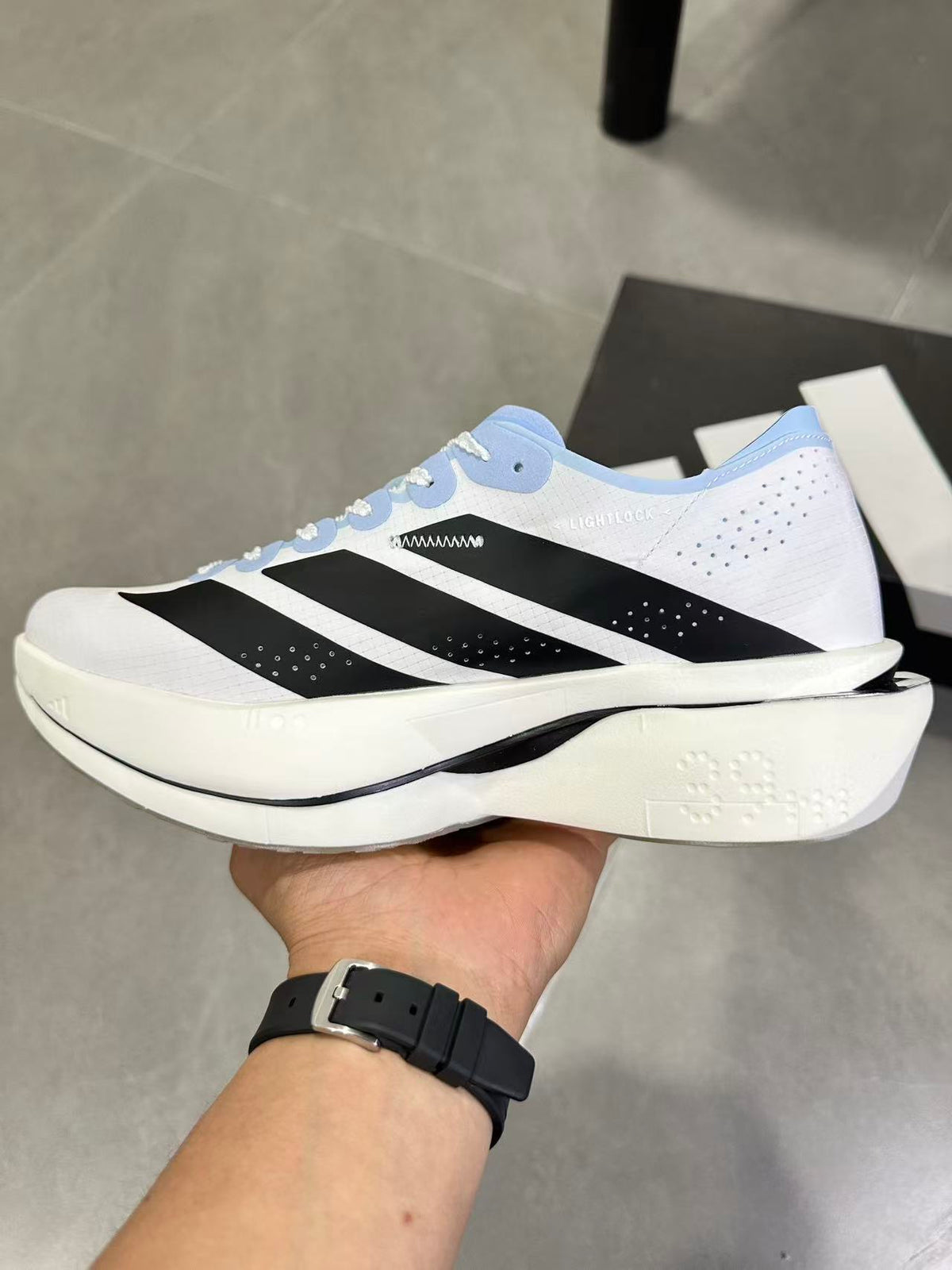 adidas Lightstrike Pro Running Shoes in White Blue KI8298 - product image from the listing.