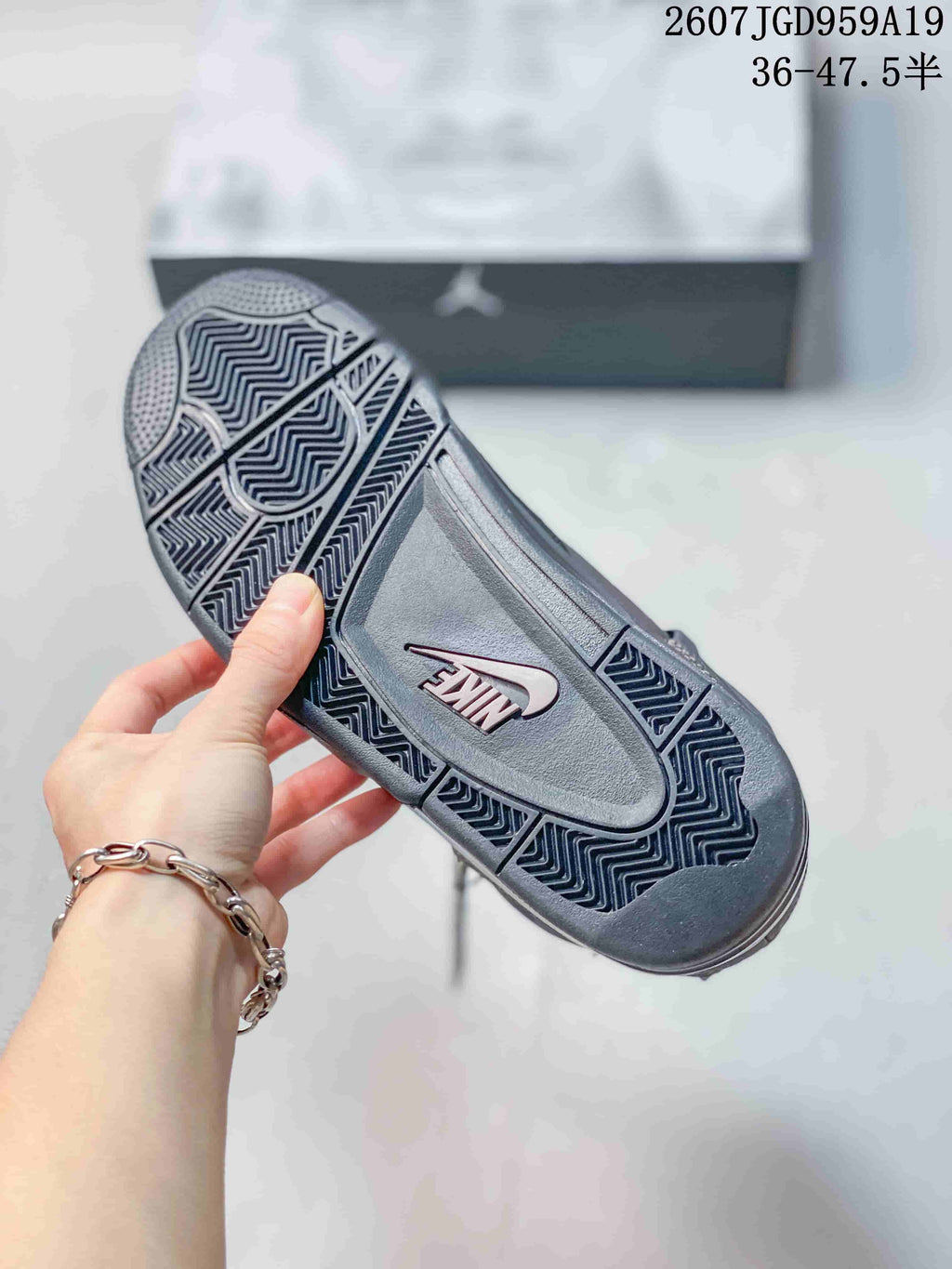 Air Jordan 4 Retro Dark Gray Sneakers JA8136 - product image from the listing.