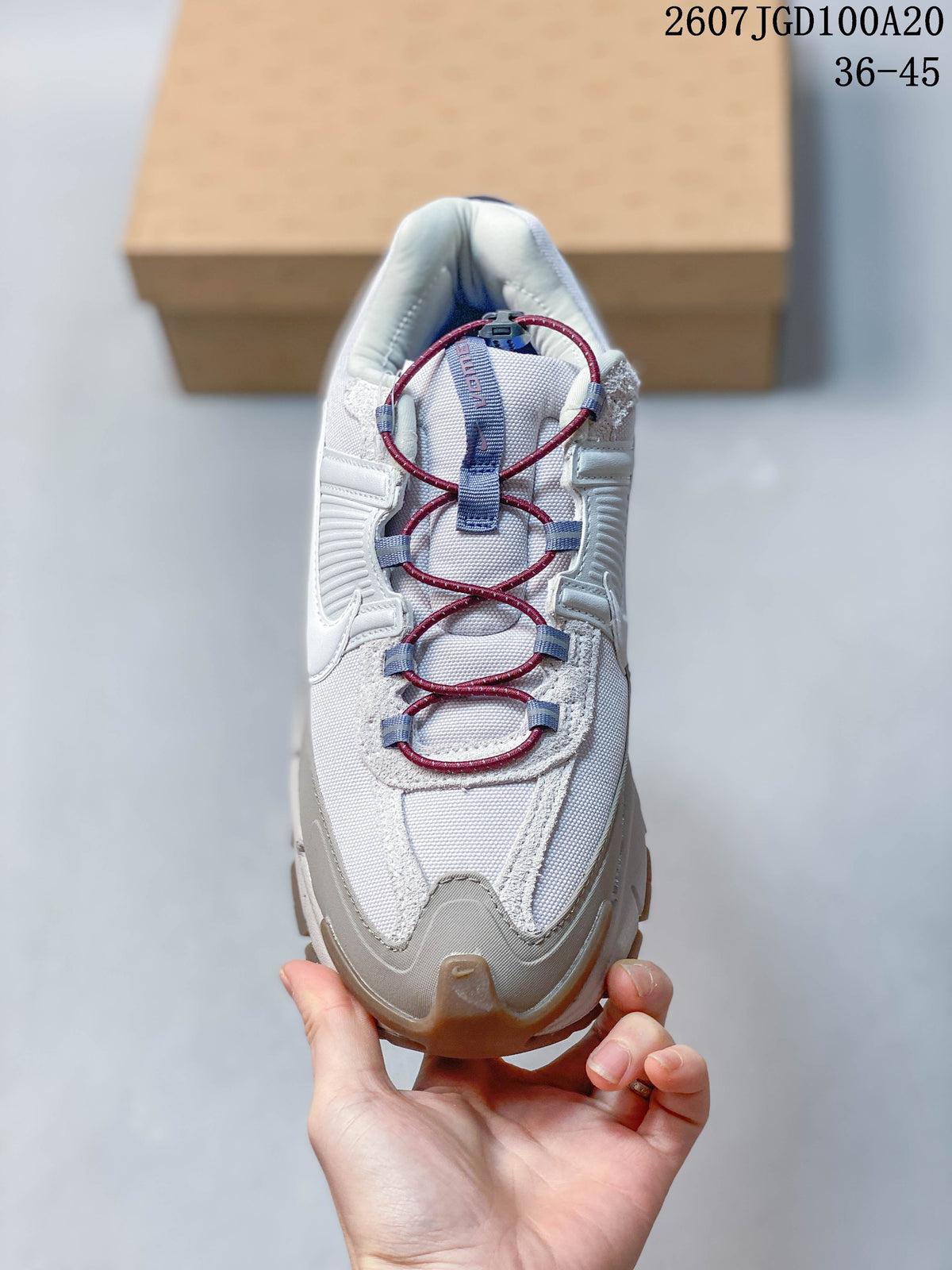 Nike Zoom Vomero Roam Sneakers in White Grey 2607TGD100A20 - product image from the listing.