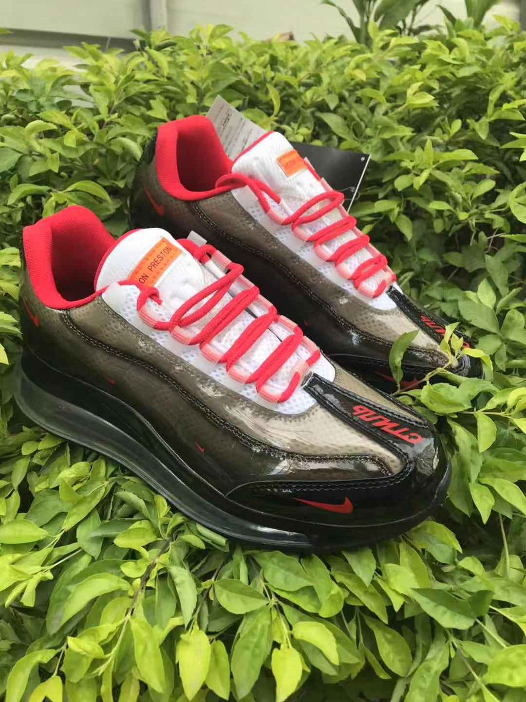 Nike Air Max 720 Sneakers in Black Smoke Grey Red - product image from the listing.