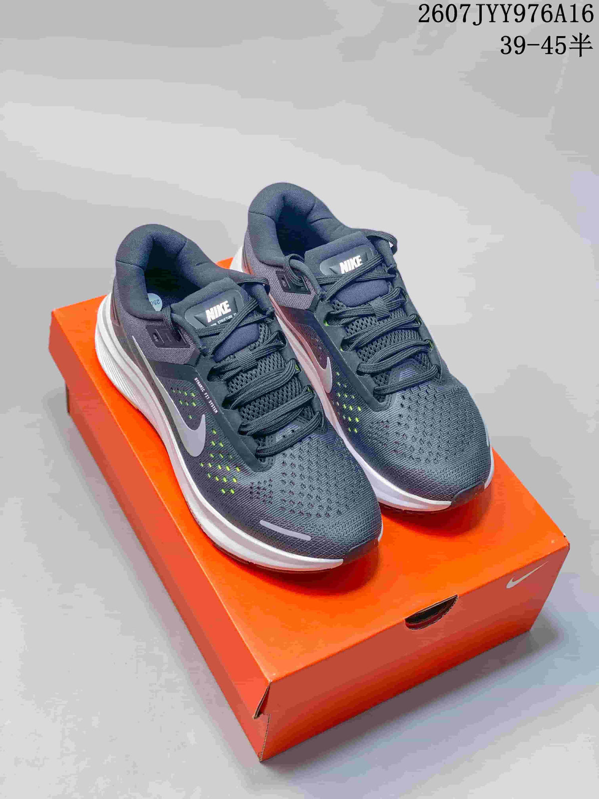 Nike Zoom Structure 23 Running Sneakers in Gray White - product image from the listing.