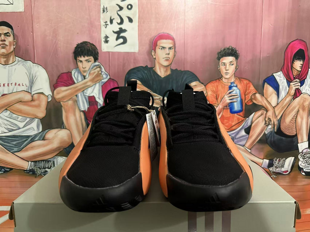 Basketball Sneakers in Black and Orange - product image from the listing.