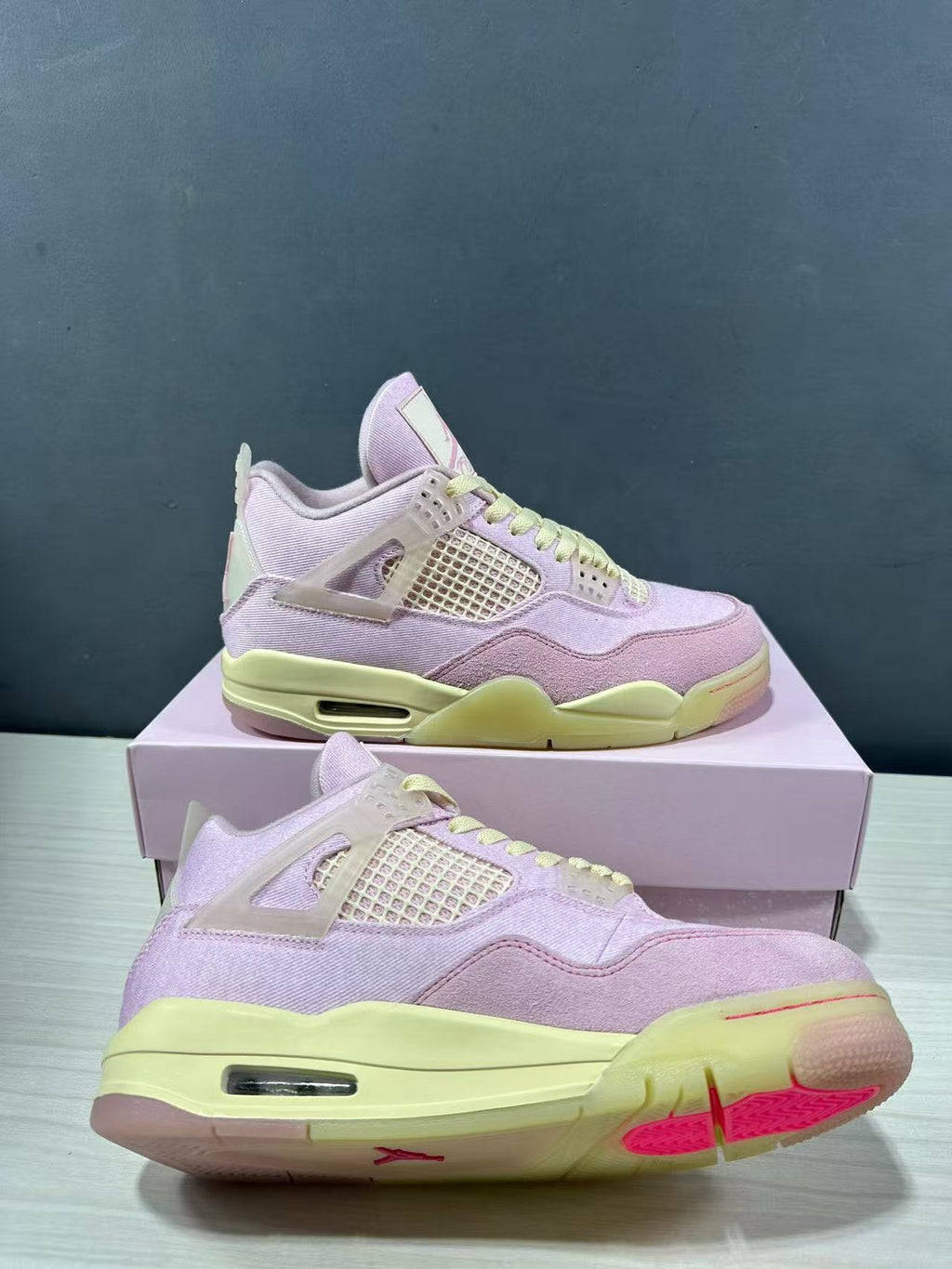 Air Jordan 4 Retro Pink Sneakers IB6716-600 - product image from the listing.