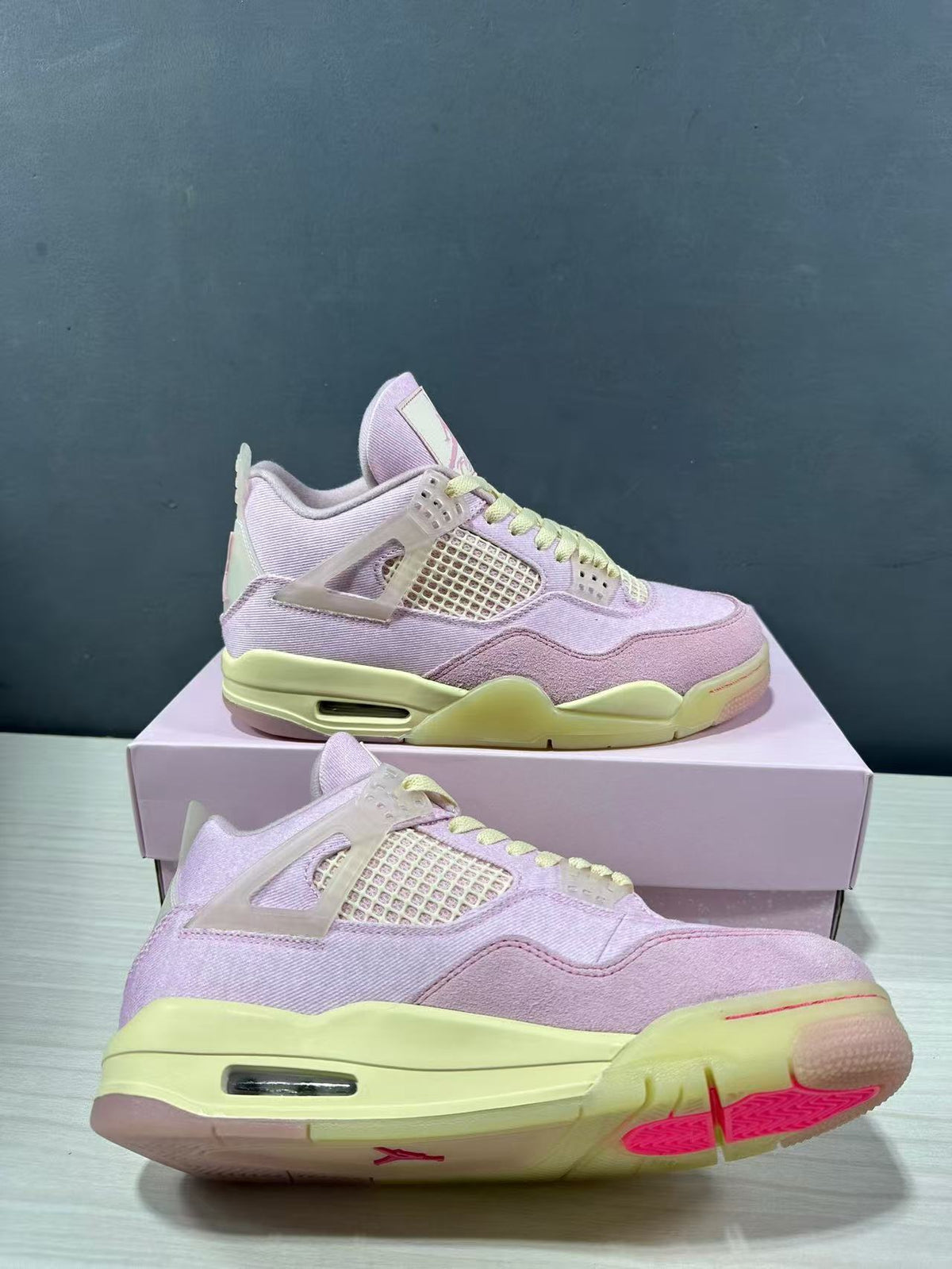 Air Jordan 4 Retro Pink Sneakers IB6716-600 - product image from the listing.
