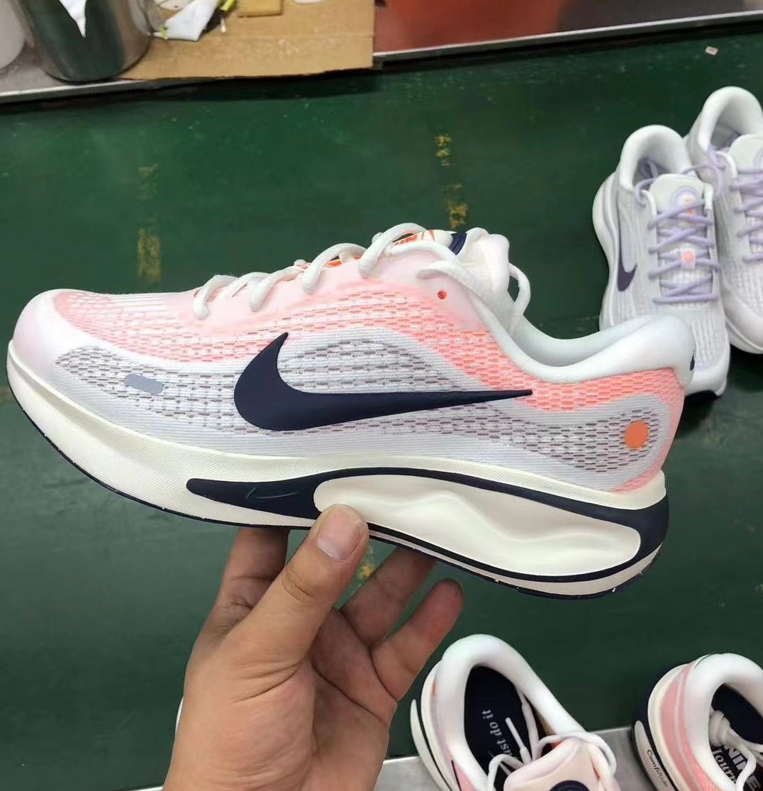 Nike Journey Run Road Running Shoes in White Coral FN0228-100 - product image from the listing.