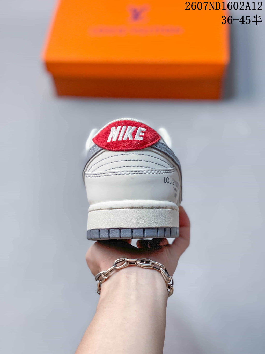 Nike SB Dunk Low Sneakers in White Gray Red 2607ND1602A12 - product image from the listing.