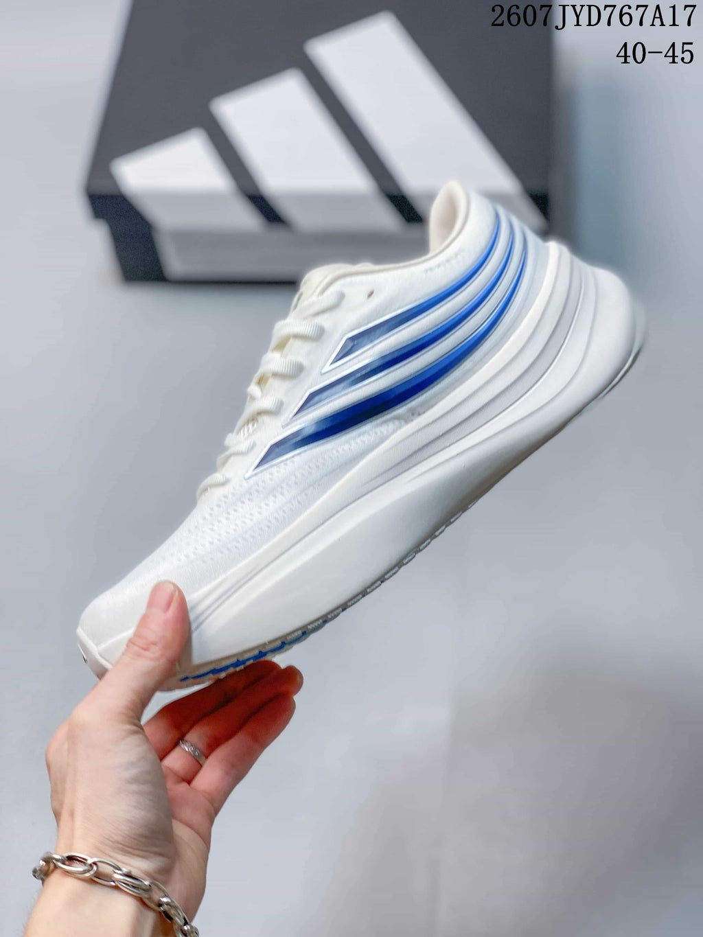 Adidas Supernova Rise 4 M Sneakers in White Blue - product image from the listing.