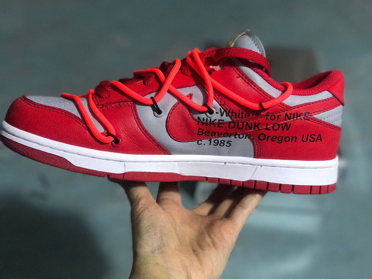 Nike Dunk Low LTHR / OW Sneakers in Red Gray CT0856-600 - product image from the listing.