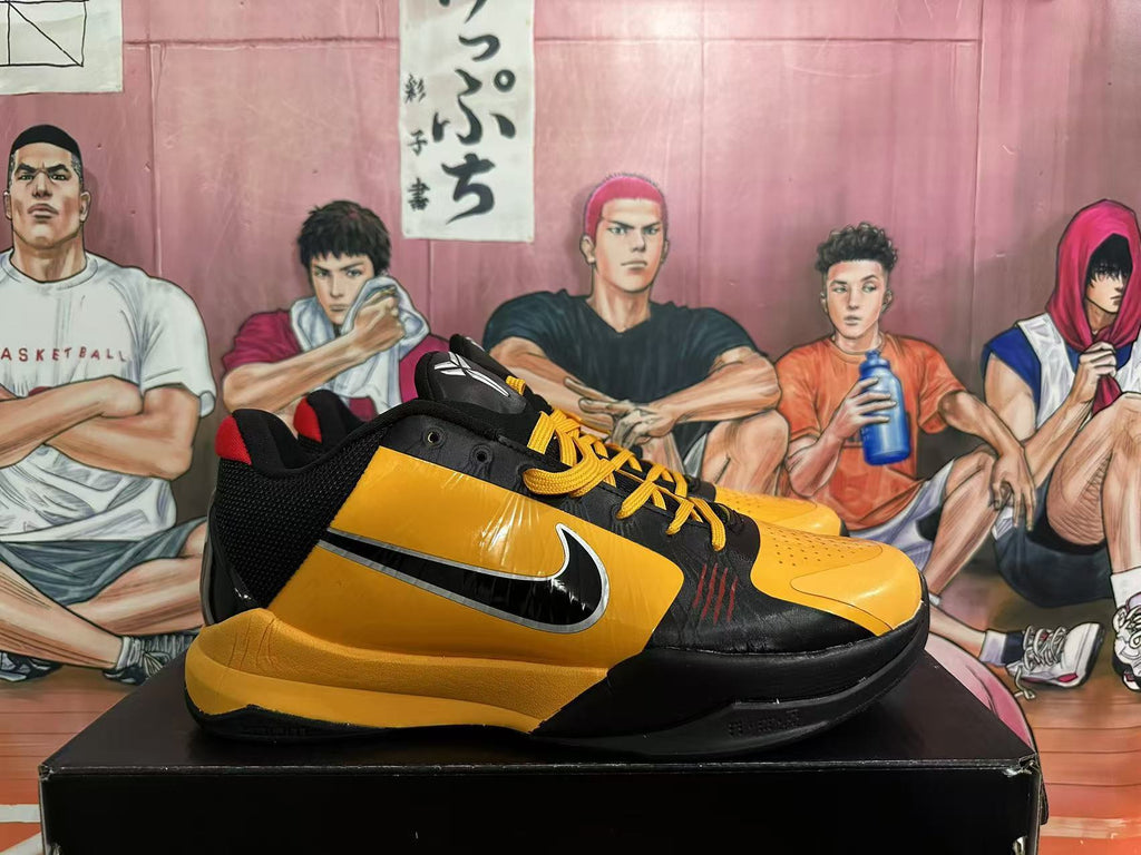 Yellow and Black Nike Kobe Basketball Shoes - product image from the listing.