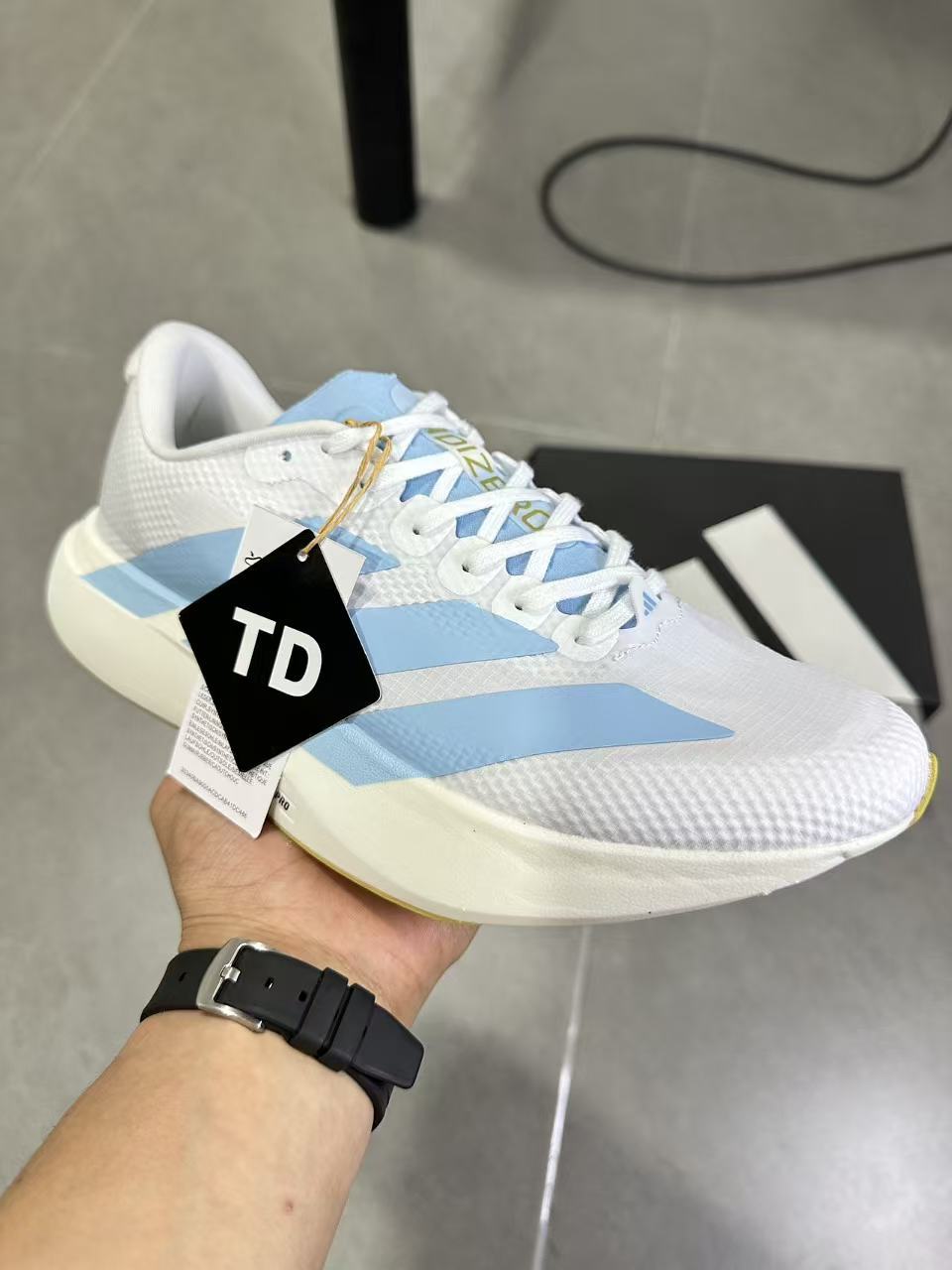Adidas Lightstrike Pro Running Shoes in White Blue JQ4527 - product image from the listing.
