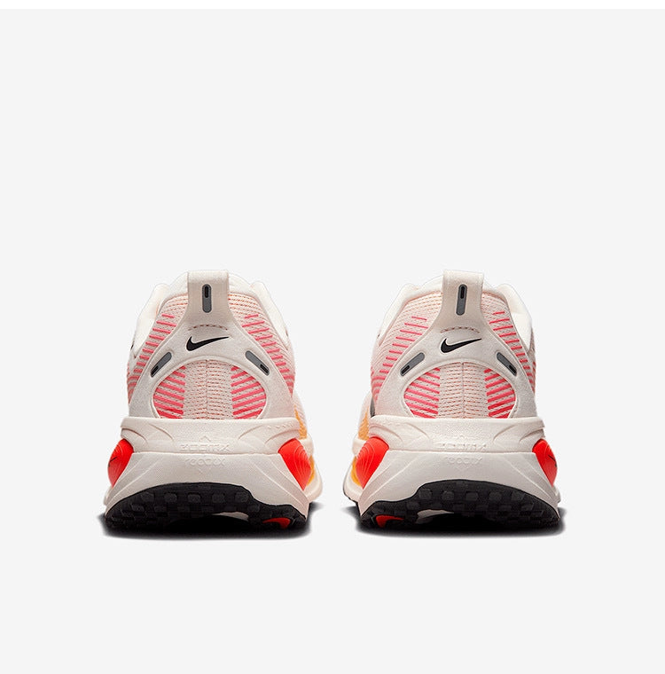 Nike Vomero 18 Running Shoes HM6804-100 in White Orange - product image from the listing.