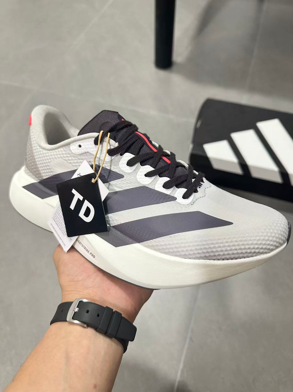 Adidas Lightstrike Pro Running Shoes in White Gray KJ3670 - product image from the listing.