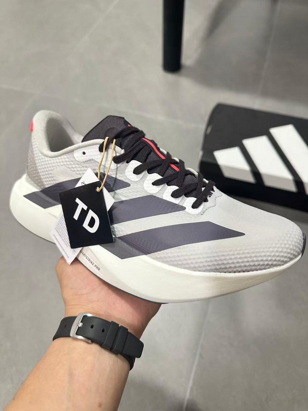 Adidas Lightstrike Pro Running Shoes in White Gray KJ3670 - product image from the listing.