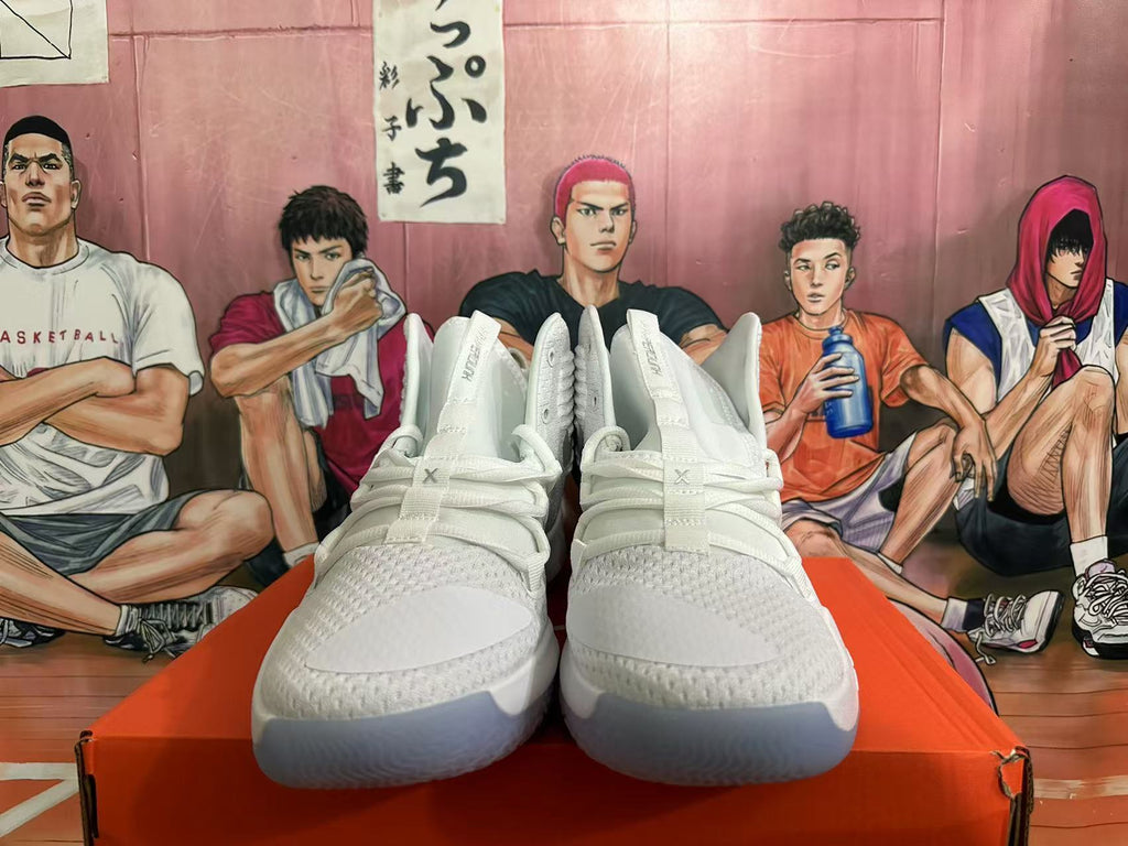 Nike Zoom Basketball Shoes in White and Silver - product image from the listing.