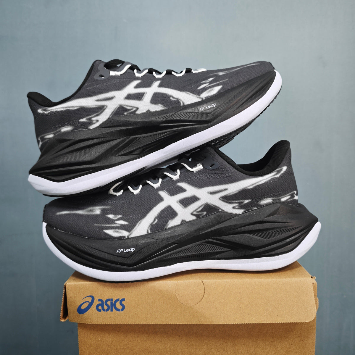 ASICS FF Leap Running Shoes in Black White 1013A177-100 - product image from the listing.