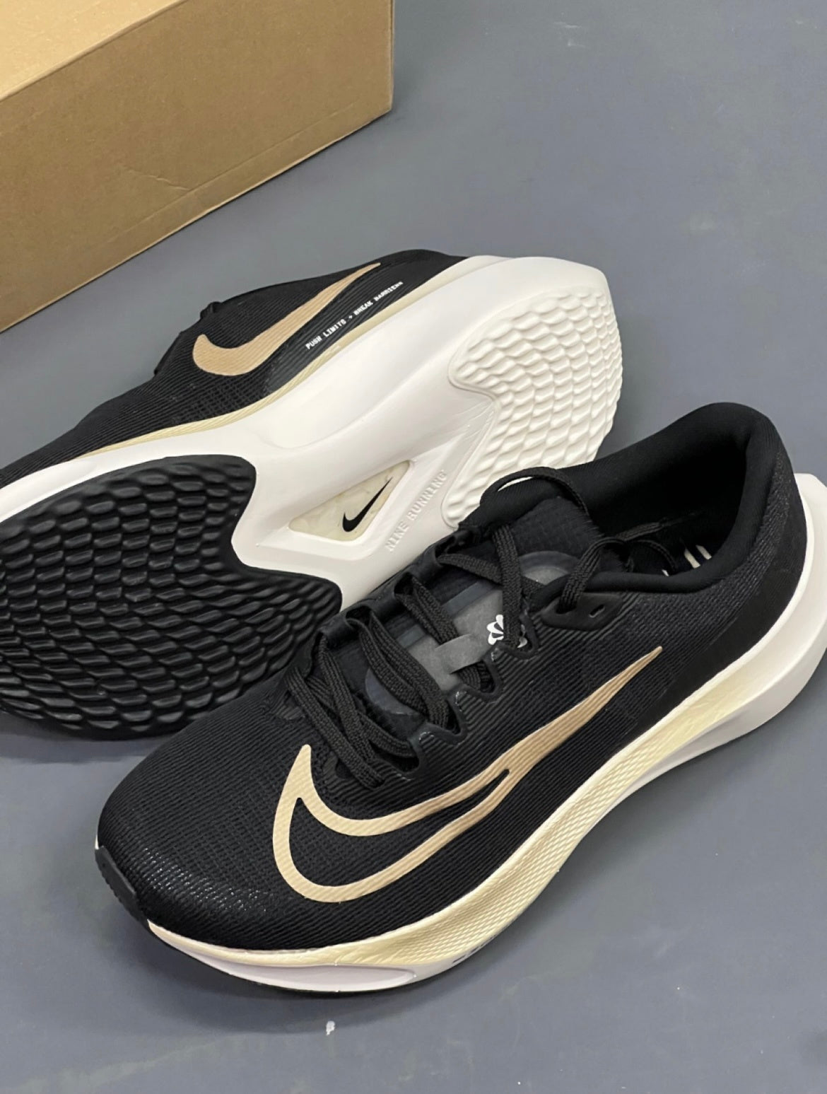 Nike Zoom Fly 5 Running Shoes in Black Gold DM8968-002 - product image from the listing.