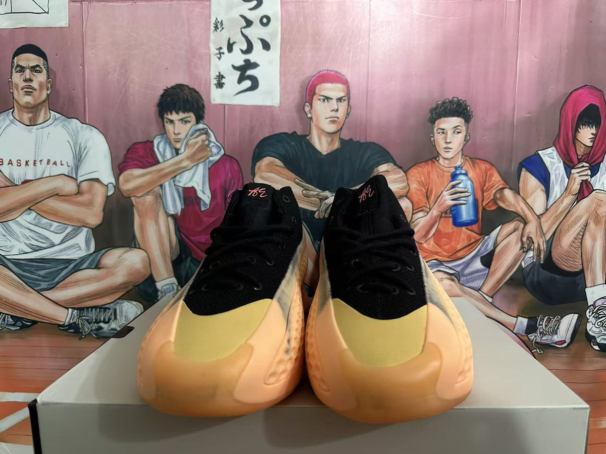 Black and Orange Adidas Basketball Shoes - product image from the listing.