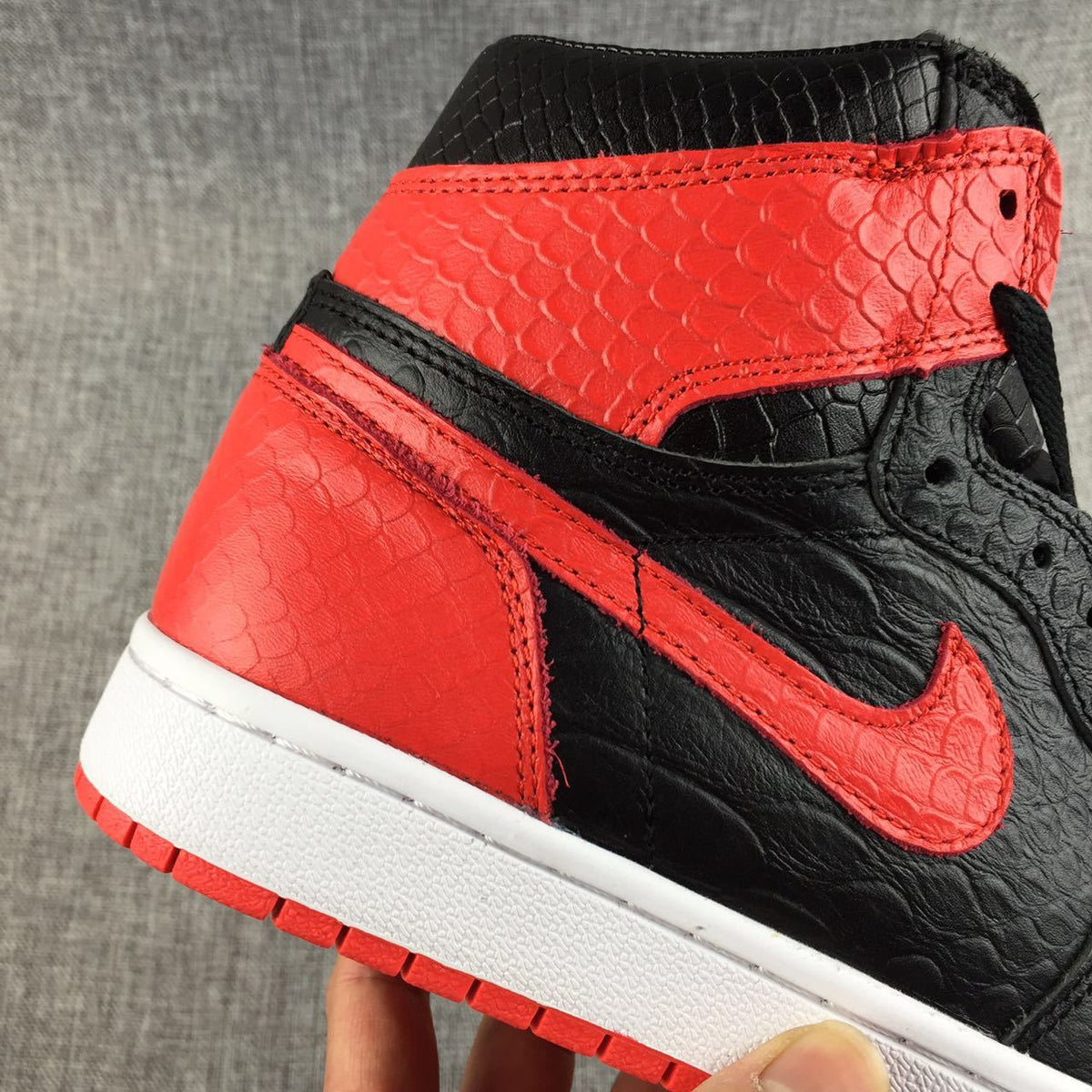 Black Red Scale-Textured Sneakers - Air Jordan 1 High - product image from the listing.