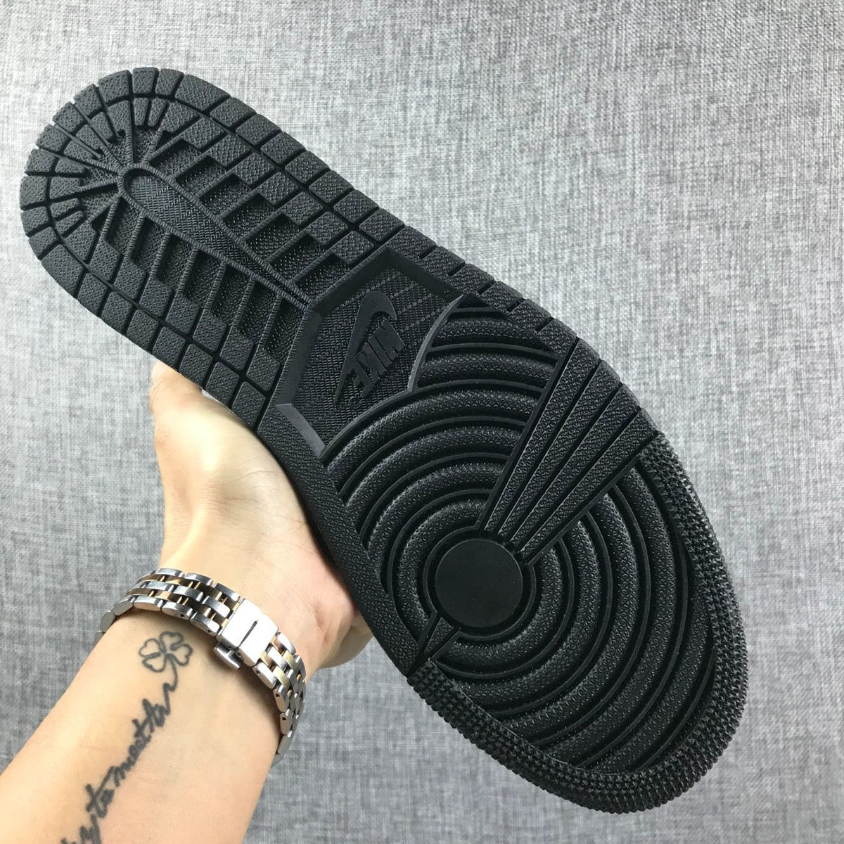 Air Jordan 1 Mid Sneakers in White and Black - product image from the listing.