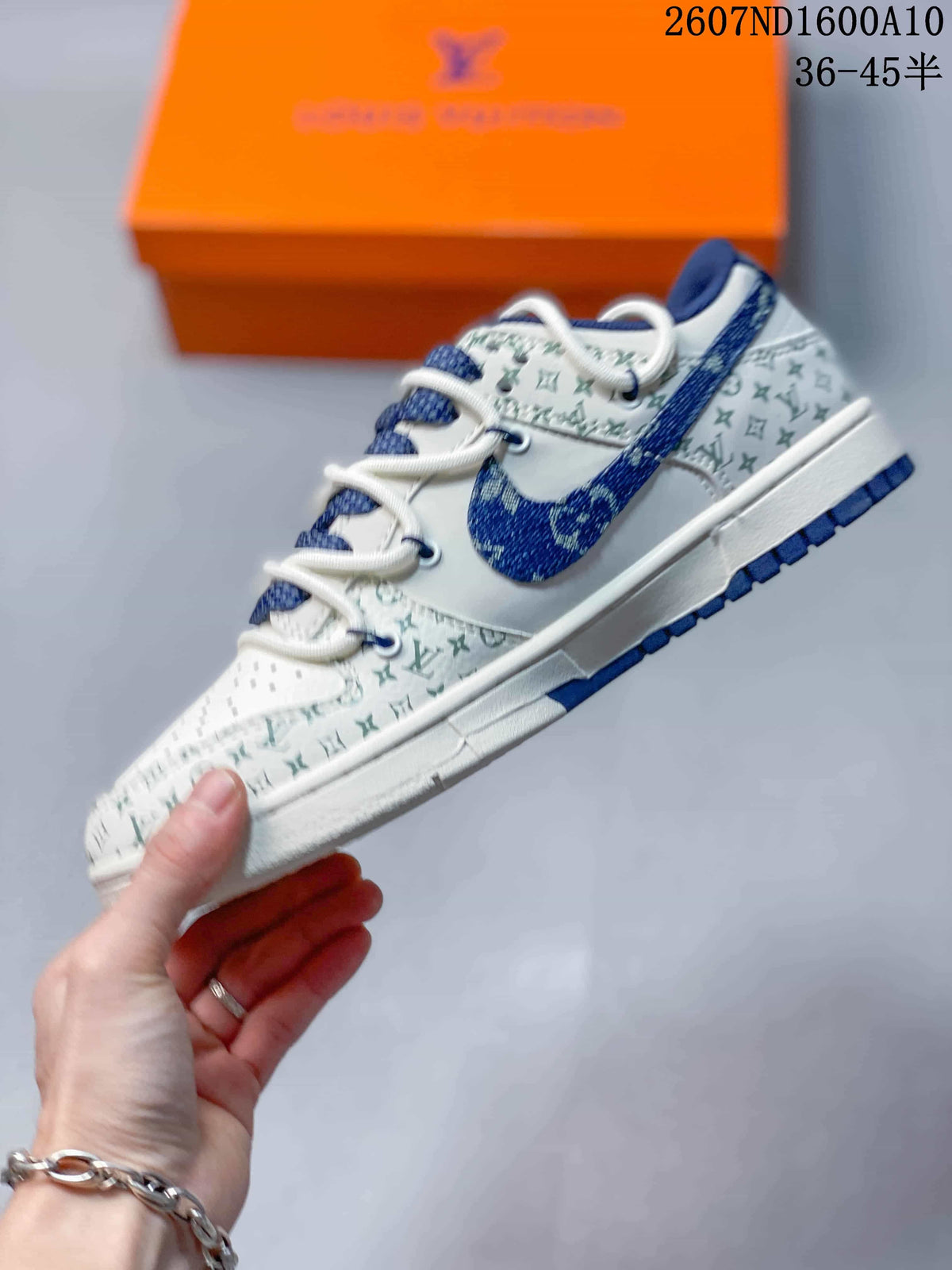 Nike SB Dunk Low White Blue Monogram Trainers 2607ND1600A10 - product image from the listing.