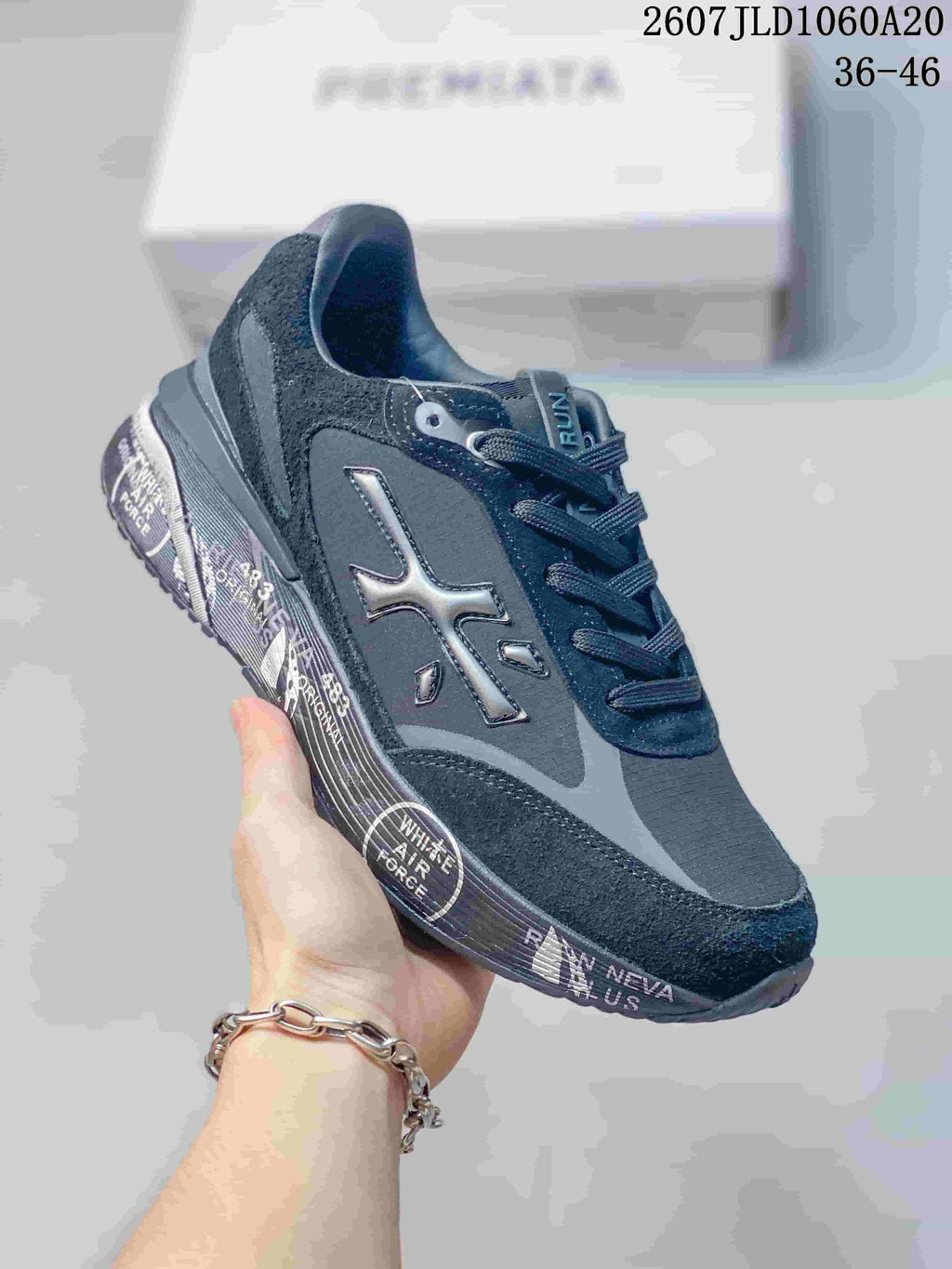Premiata Lander Trainers in Black and Gray 712800TIT - product image from the listing.