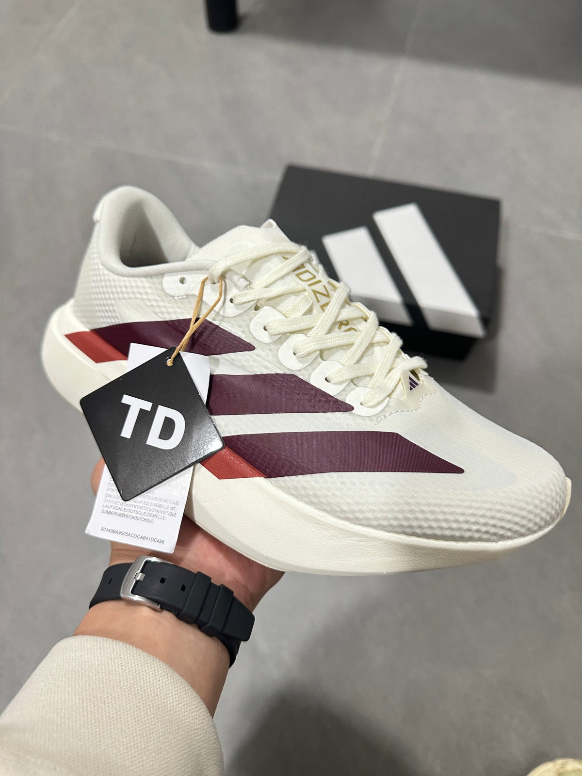 White and Burgundy Adidas Lightstrike Pro Running Shoes - product image from the listing.