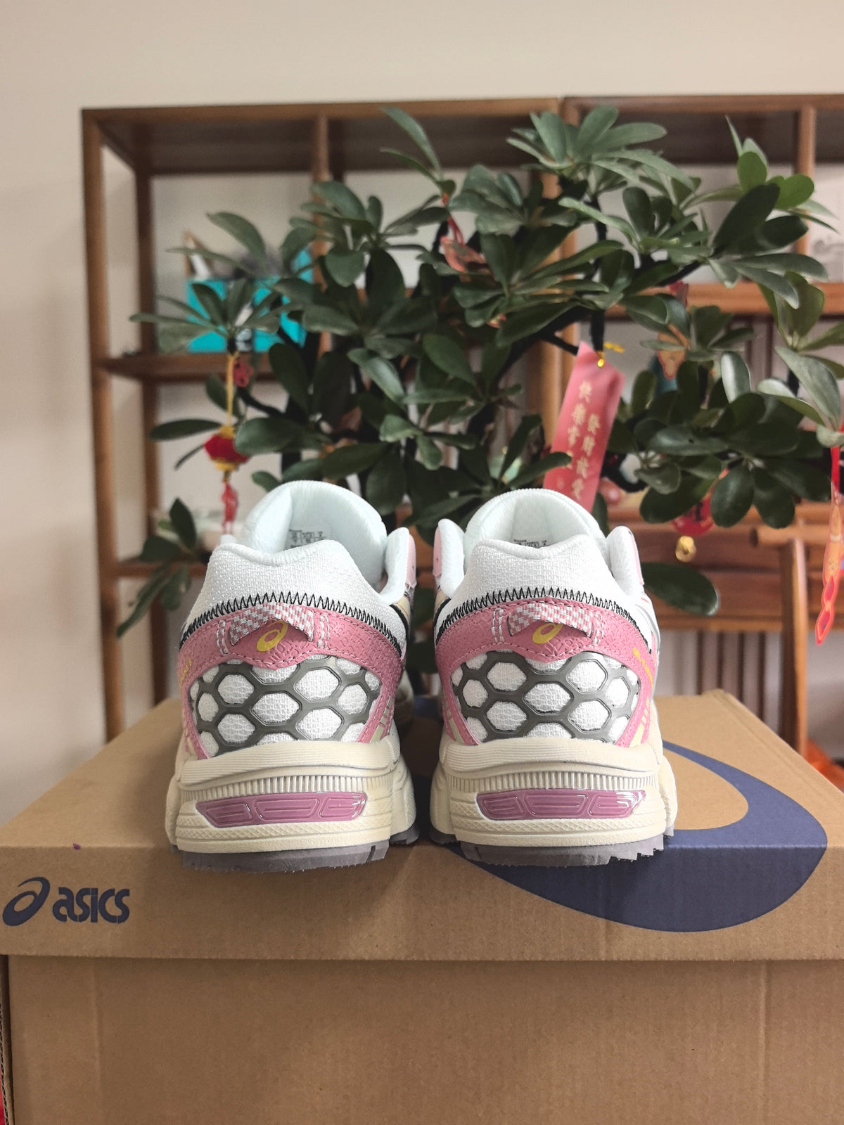 ASICS K8 Sneakers in Pink and White - product image from the listing.