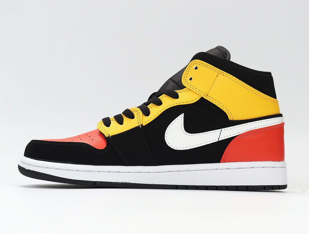 Jordan 1 Low Sneakers in Black Yellow Red 852542-087 - product image from the listing.