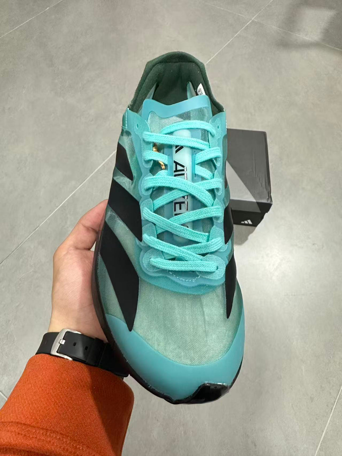 Nike Air Max Scorpion Flyknit Sneakers, in Turquoise and Black IH5588 - product image from the listing.