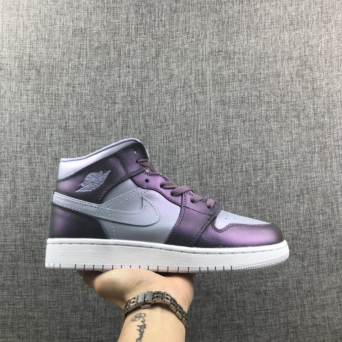 Jordan 1 Mid Sneakers in Purple AV5174-400 - product image from the listing.