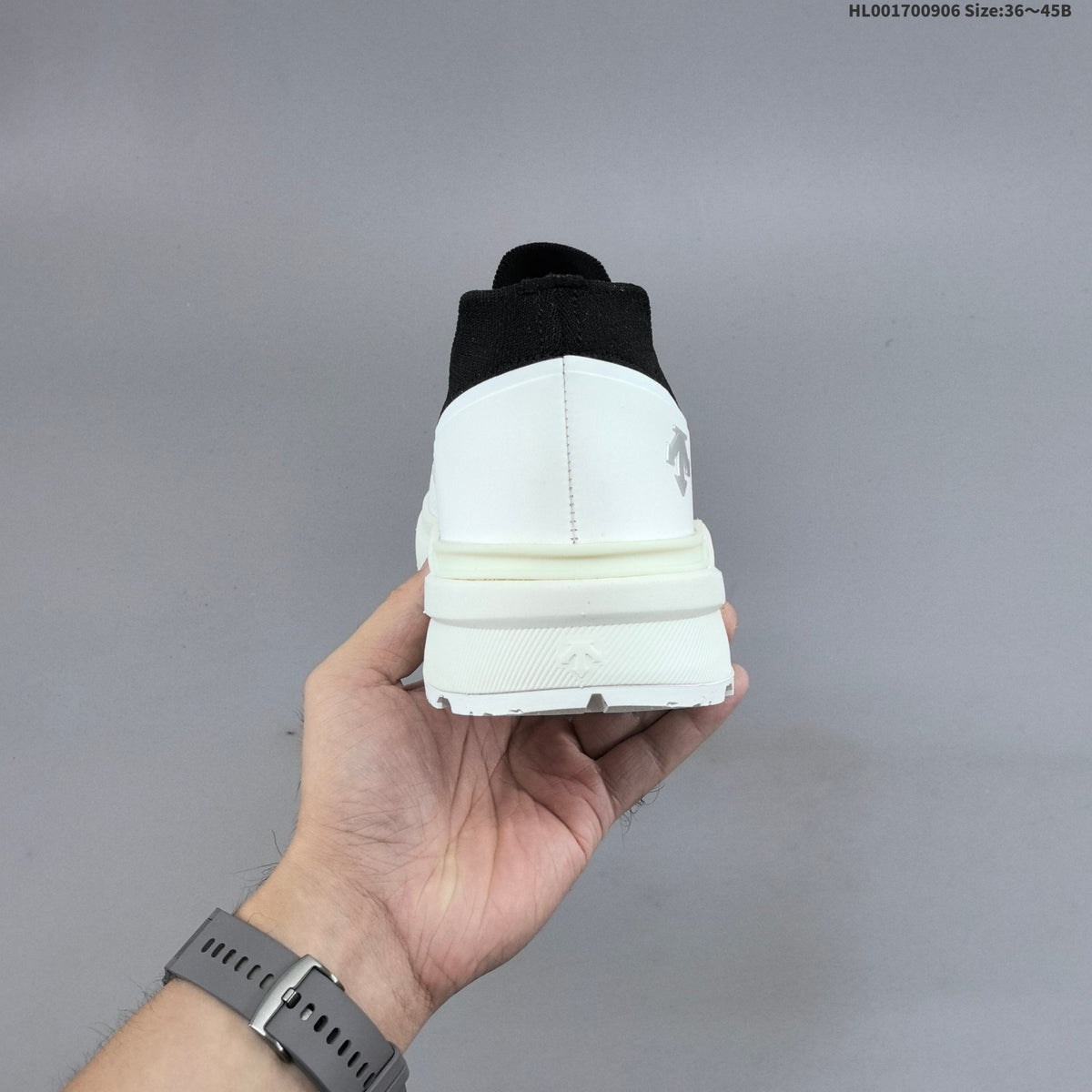 Descente Dualis Primer Slip-On Sneakers, in White and Black - product image from the listing.