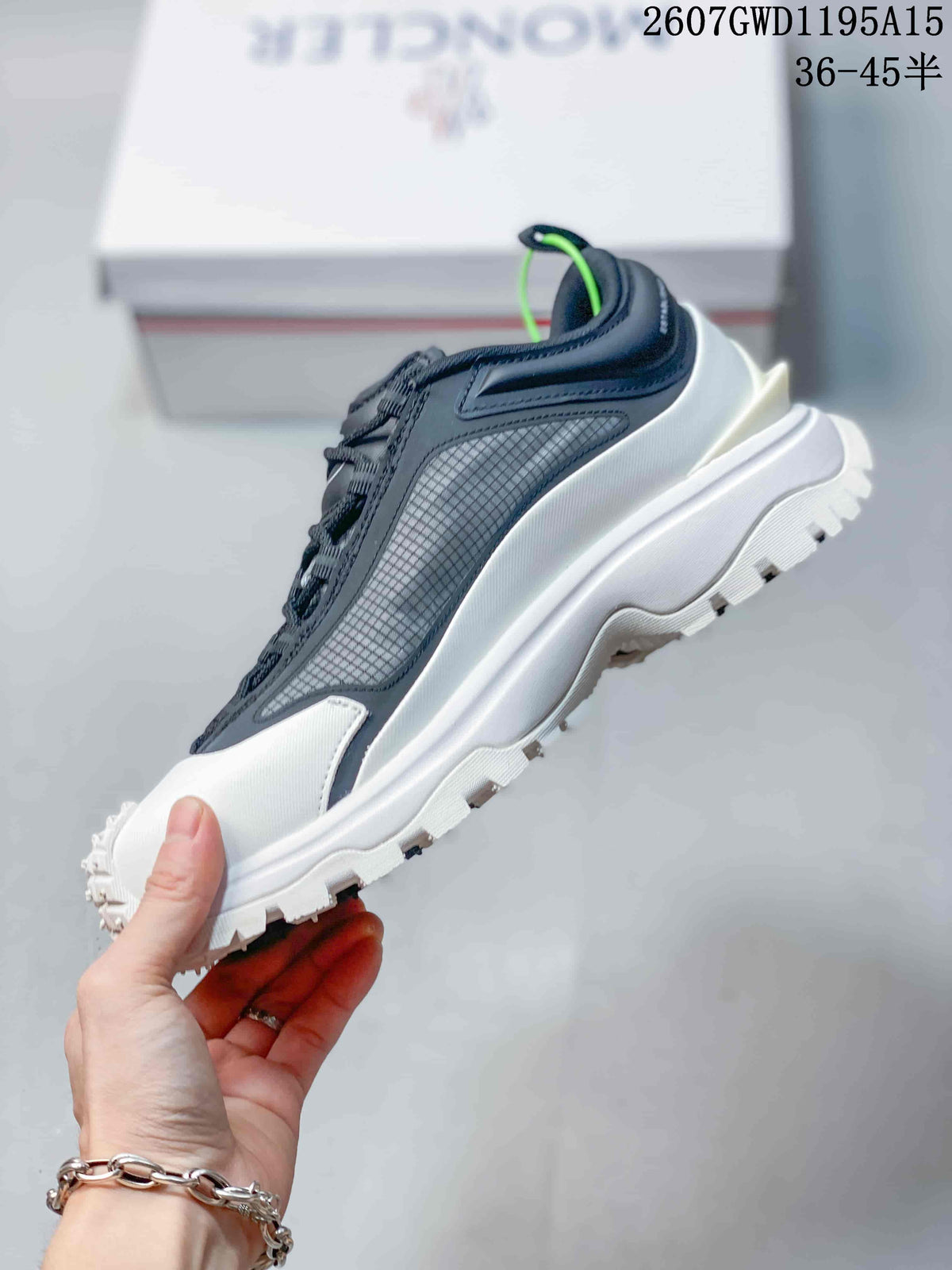 Moncler Trailgrip Lite2 Sneakers in White Black 2607GWD1195A15 - product image from the listing.