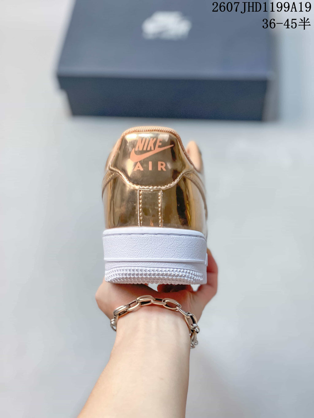 Nike Air Force 1 '07 Low Sneakers in Metallic Gold - product image from the listing.