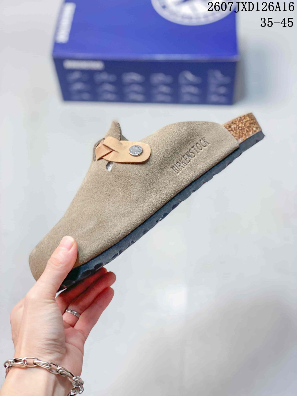 Birkenstock Boston Closed-Toe Mule in Taupe - product image from the listing.