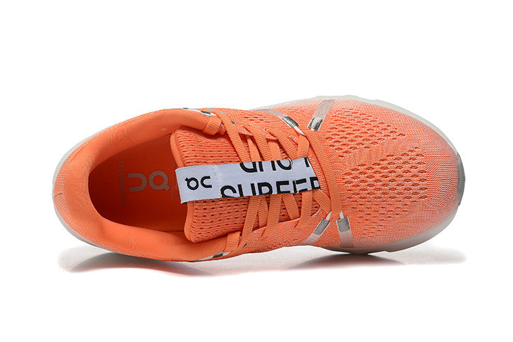 On Cloudsurfer Running Shoes in Orange White - product image from the listing.