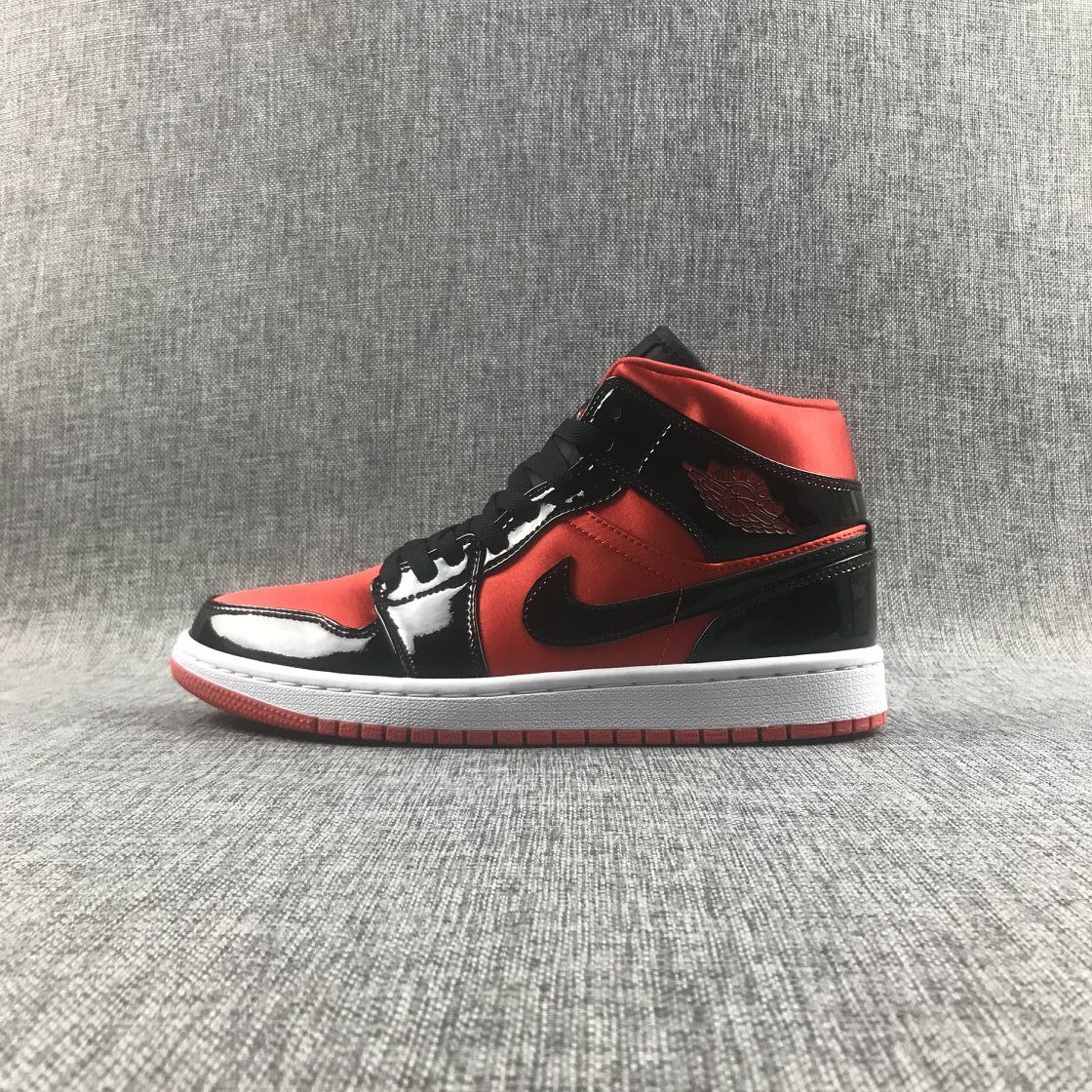 Air Jordan 1 Mid Sneakers in Black Red White BQ6472-600 - product image from the listing.