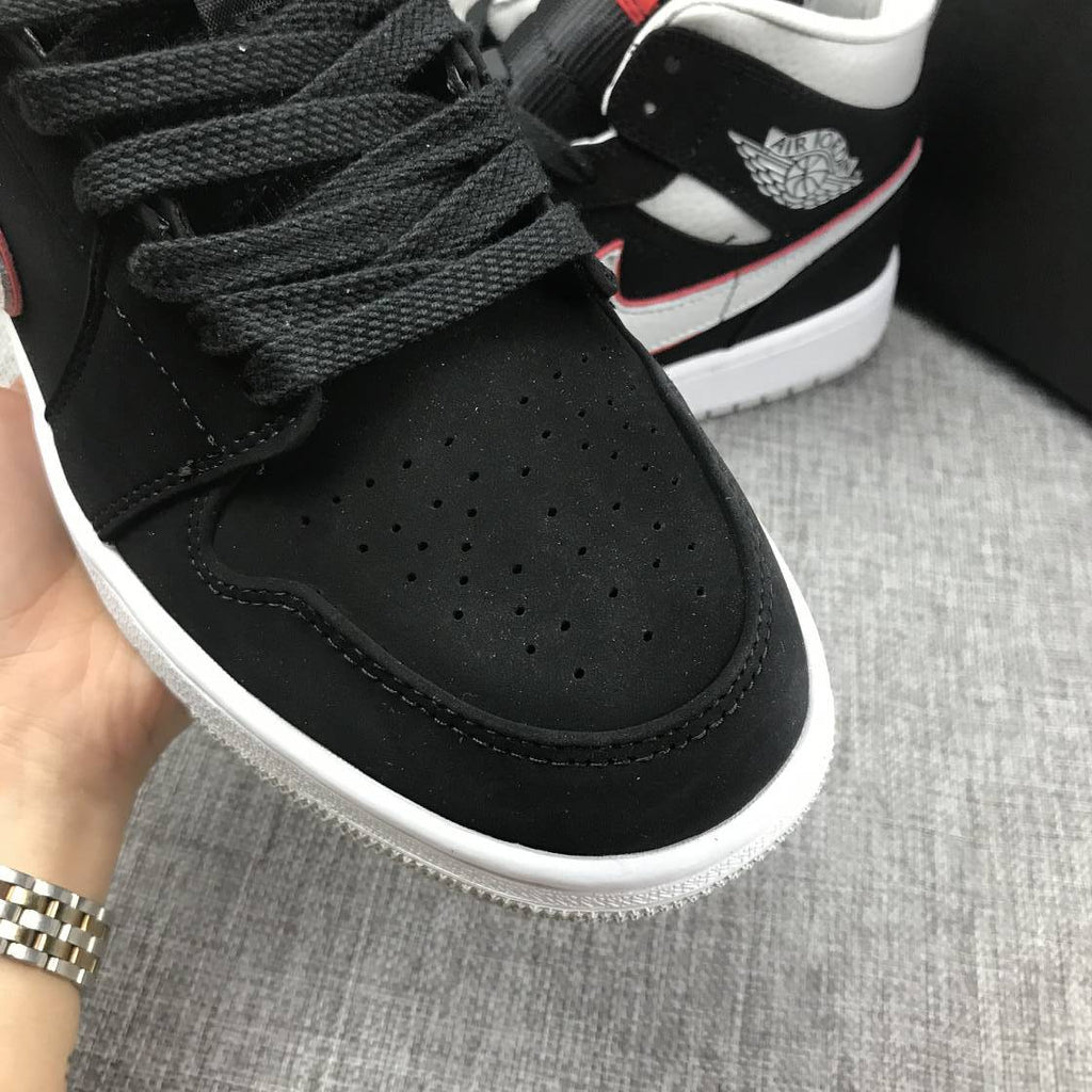 Air Jordan 1 Mid Black, Sneakers in White & Red 554724-060 - product image from the listing.