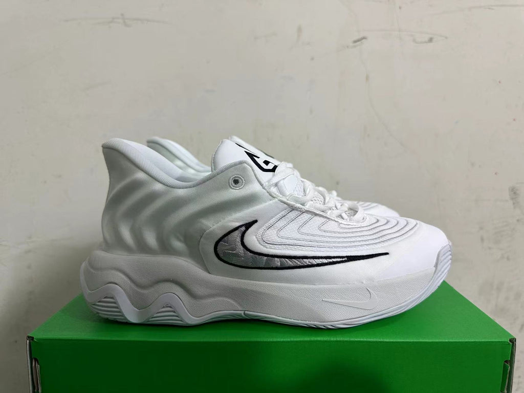 Nike White and Grey Basketball Trainers with Black Accents - product image from the listing.
